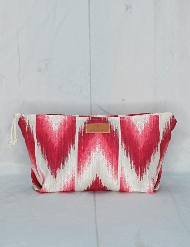 Large Majorcan ikat red trapezoid toiletry bag | Salotto